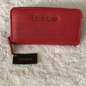 NWT. Bebe red wallet